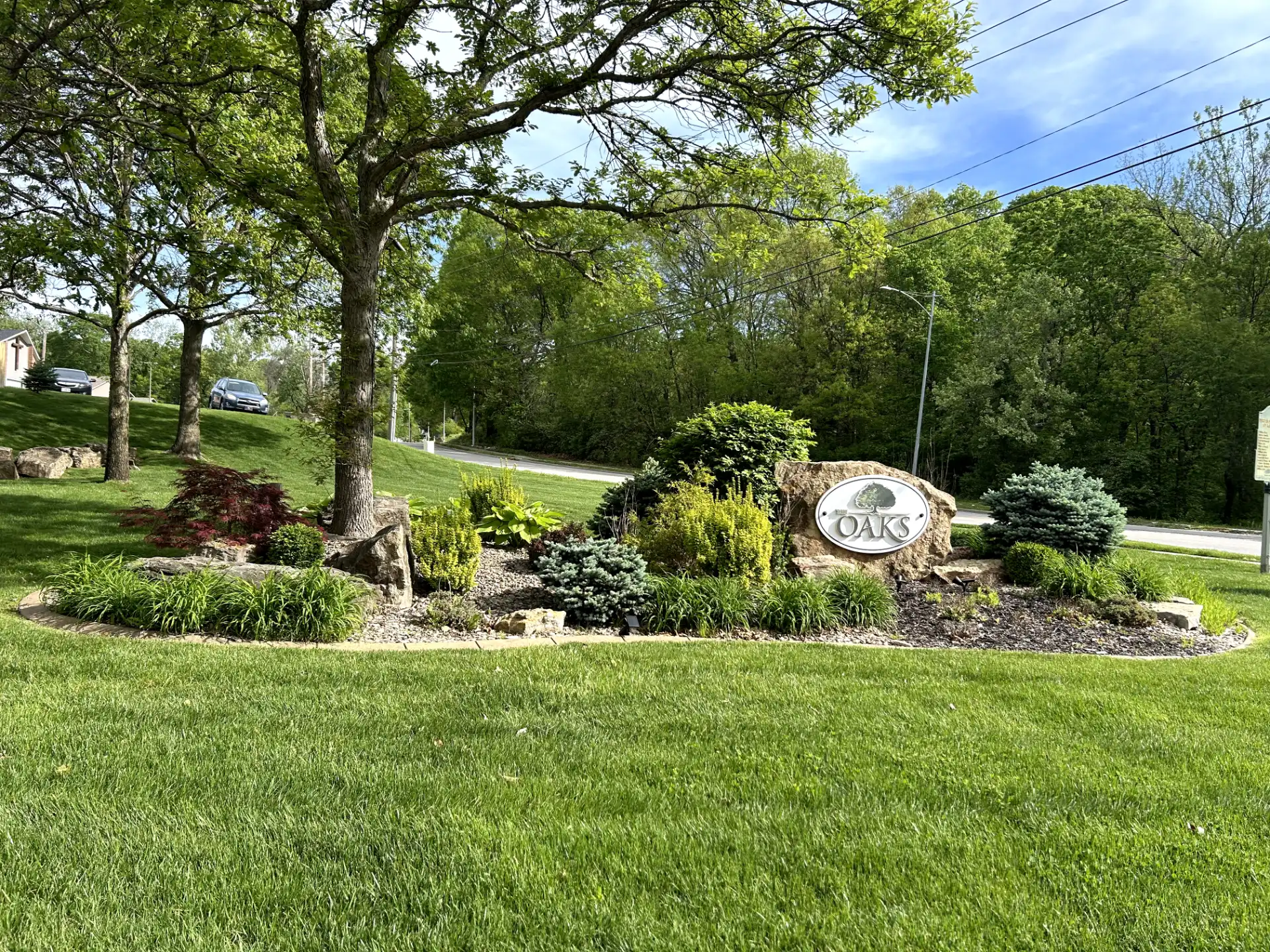 The Oaks community entrance sign